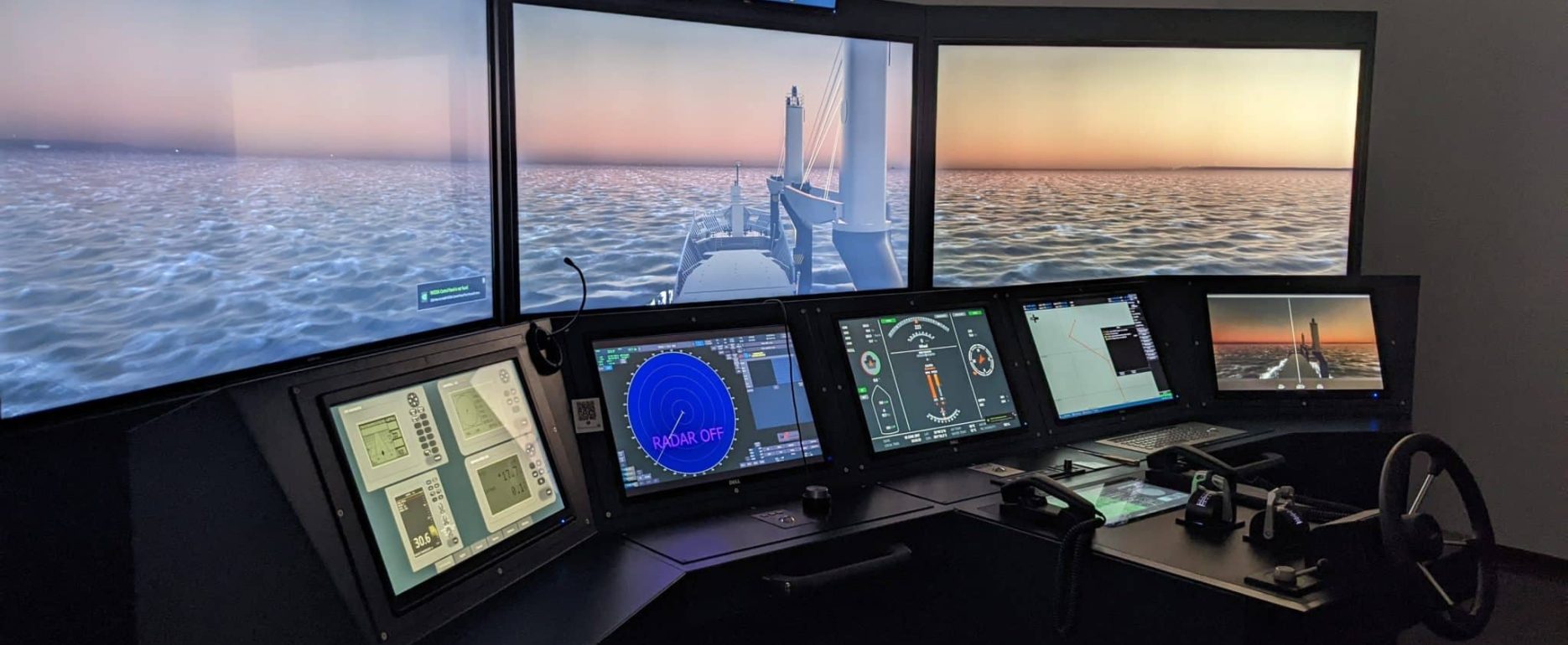 NAUTIS full mission bridge simulator console with panoramic visuals, radar and conning displays