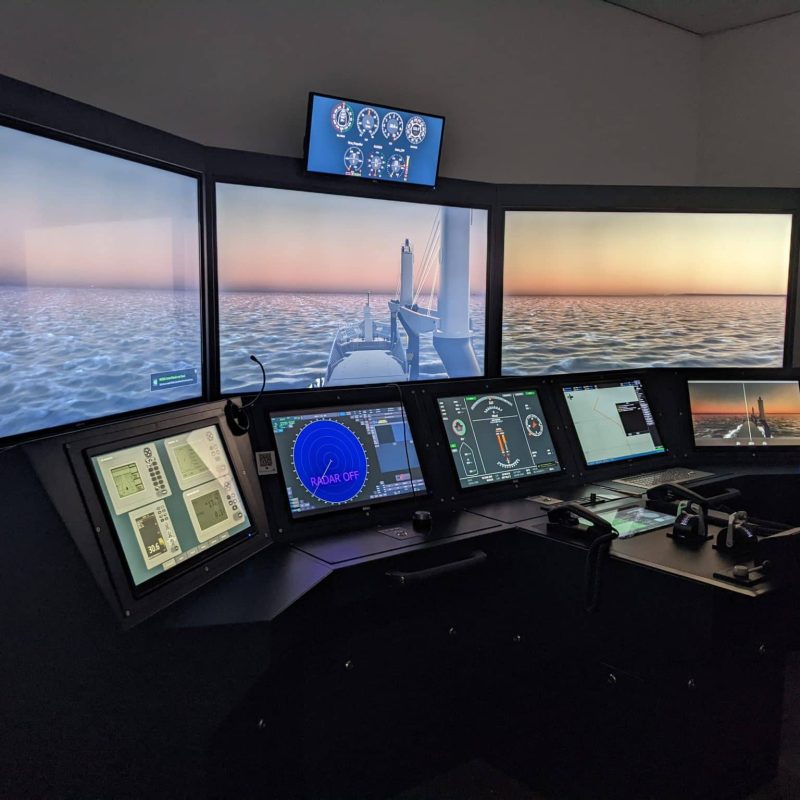 NAUTIS full mission bridge simulator console with panoramic visuals, radar and conning displays