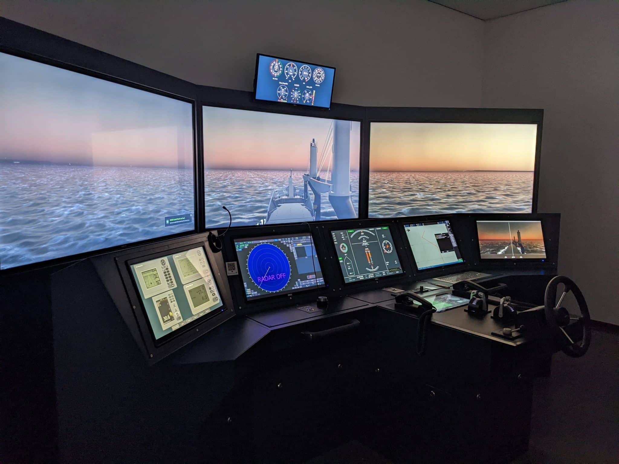 NAUTIS full mission bridge simulator console with panoramic visuals, radar and conning displays